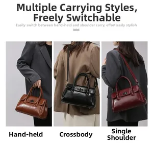 Detailed view of women's leather satchel showing handheld, crossbody and shoulder modes