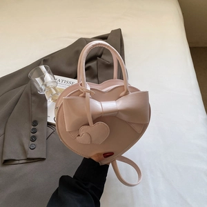 Sac à main rose en forme de cœur avec grand nœud et bandoulière réglable de style ins