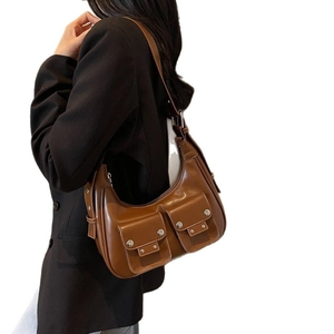 Brown vintage faux leather underarm bag with silver rivets and pockets for women