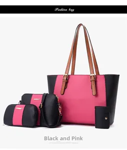 Detalle del conjunto de bolsos de varias piezas en negro y rosa con bandolera