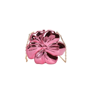 Mini metallic pink flower bag with golden chain strap for women in a trendy niche design