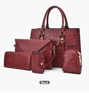 5-piece burgundy red women's handbag set with crocodile pattern and golden hardware details