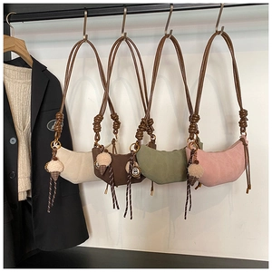 Four colors of crescent shoulder bags with knotted straps and plush ice cream charms