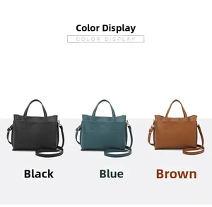 Three leather tote bags in black, blue, and brown with embossed letters and shoulder straps