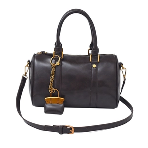 Minimalist dark brown leather Boston handbag with gold hardware and shoulder strap