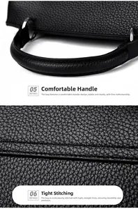 Close-up of black lychee grain leather handbag with reinforced handle and precision stitching
