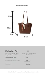 Guida alle taglie della borsa tote con dimensioni 35x28x9cm e dettagli sul materiale