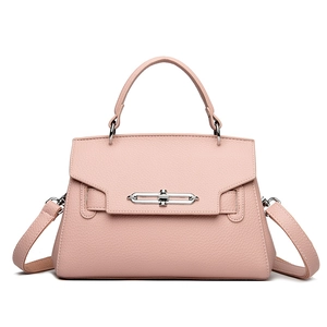 Pink lychee pattern leather handbag with silver twist lock and adjustable shoulder strap
