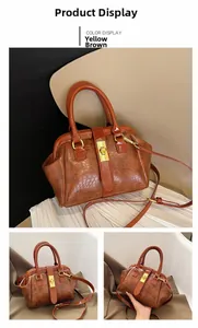 Detailed views of yellow-brown crocodile embossed handbag with golden twist lock and strap
