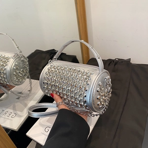 Sparkling silver rhinestone cylinder handbag with thick handle and sleek chain strap