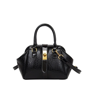 Elegant black crocodile embossed tote bag with gold lock and detachable shoulder strap
