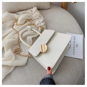 Elegant white square PU leather handbag with gold twist handle and chain strap