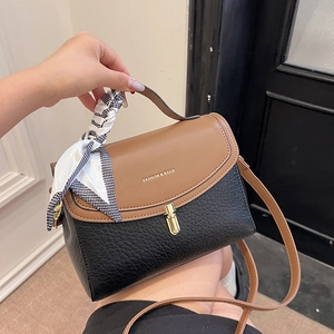 Brown and black crossbody bag with silk scarf handle and golden metallic lock