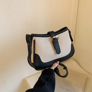 Minimalist canvas and black leather crossbody handbag with gold buckle for women