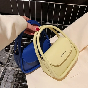 Mini candy-colored flap handbag in dark blue and beige with fashion lettering detail