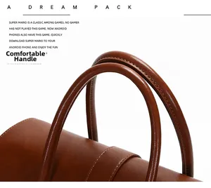 Detail of comfortable brown leather handle with neat stitching on a luxury tote bag
