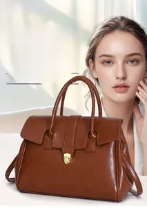Detail showing internal compartments of this brown leather business tote for organized storage