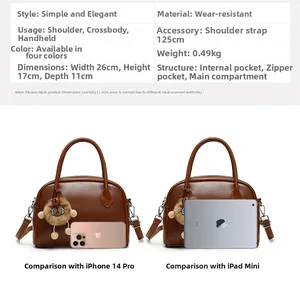 Dimensiones detalladas del bolso Boston marrón con charm de león y comparativa