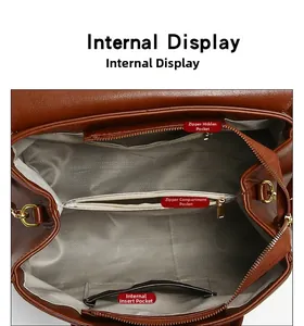 Internal view of large vintage tote bag showing zippered pockets and herringbone lining