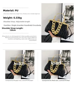 Detail view of black pleated PU evening bag with gold metal frame and thick chain strap