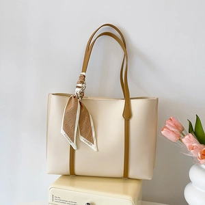 Creamy white large tote bag with brown handles and a stylish bear print silk scarf