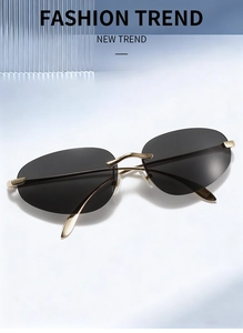 Vue détaillée des lunettes de soleil ovales sans monture avec branches en métal doré