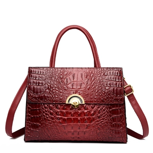 Retro crocodile embossed crossbody bag in deep red with elegant golden buckle and top handle