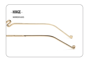 Detail of high-gloss gold metal hinges and textured temples of rimless sunglasses