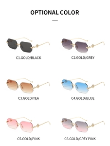 Detailed grid of rimless octagon sunglasses featuring snake-engraved gold metal temples