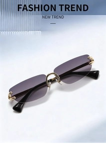Detail of rimless sunglasses with purple gradient lenses and gold metallic bridge
