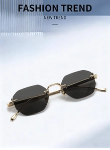 Détail de lunettes de soleil octogonales sans monture avec branches en métal doré