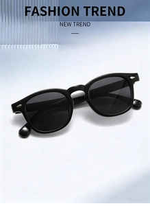 Detail of retro round black sunglasses frame with silver diamond metal stud accents