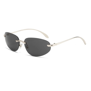 Lunettes de soleil Y2K ovales sans monture avec cadre en métal argenté et verres foncés