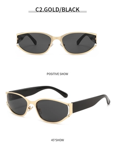 Futuristic gold metal oval sunglasses with black lenses and wide temples in two angles