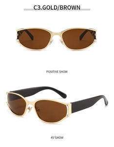 Futuristic oval gold metal frame sunglasses with dark brown lenses and wide black temples