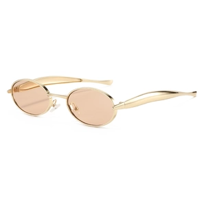 Oval gold metal sunglasses with brown lenses and stylish wavy temples on white background