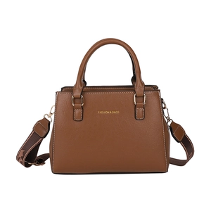 Minimalist dark brown tote bag with top handles and printed crossbody strap