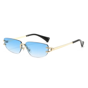 Occhiali da sole chic senza montatura con lenti blu sfumate e aste in metallo dorato