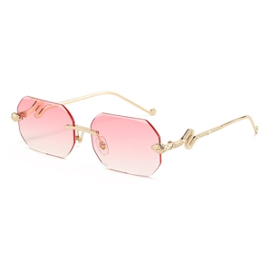 Retro rimless octagonal sunglasses with pink gradient lenses and golden snake temples