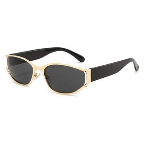Futuristic oval sunglasses with gold metal frames and wide black temples on white background