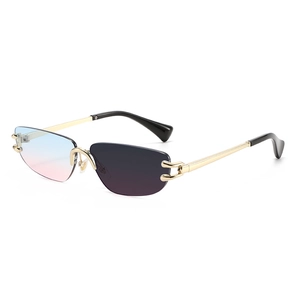 Fashionable rimless sunglasses with gradient lenses and gold C-shaped metal accents