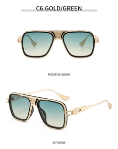 Detail of gold metal pilot sunglasses with textured frames and yellow-green gradient lenses