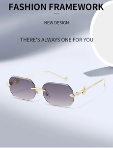 Detail of rimless sunglasses featuring gradient purple lenses and gold snake temples