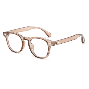 Vintage round champagne sunglasses with silver rivets and transparent frame design