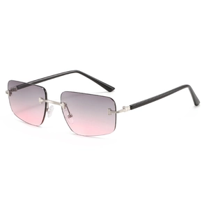 Fashionable rimless sunglasses with pink-grey gradient lenses and silver metal temples