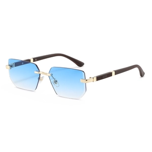Chic rimless square sunglasses with blue gradient lenses and gold accents for women