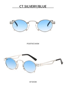 Detail view of retro silver metal round sunglasses with blue gradient lenses