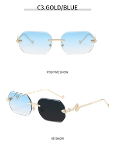 Detail of rimless octagonal sunglasses with blue gradient lenses and golden snake temples
