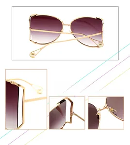 Détail de lunettes de soleil papillon avec monture dorée, perles et verres dégradés