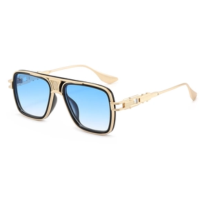 Chic oversized aviator sunglasses with gold metal frame and blue gradient lenses
